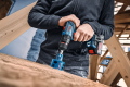 o587239v82 EXSB18V-90_Application_Drilling_Hole_Saw_Close_1884_T5_Bluelook.png